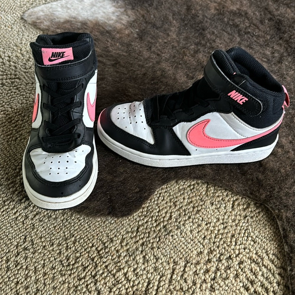 Hot pink and black high top Nike